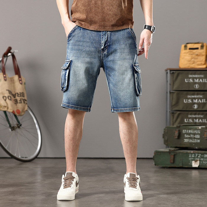 Men's blue vintage wash denim cargo shorts with spacious pockets for summer everyday wear