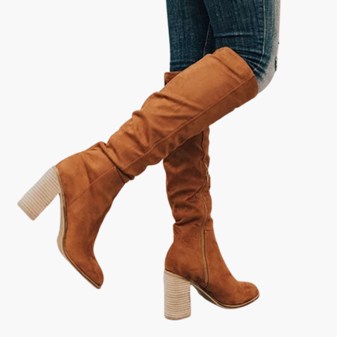 Women's black slouch knee-high boots with structured block heel and relaxed pull-on shaft design