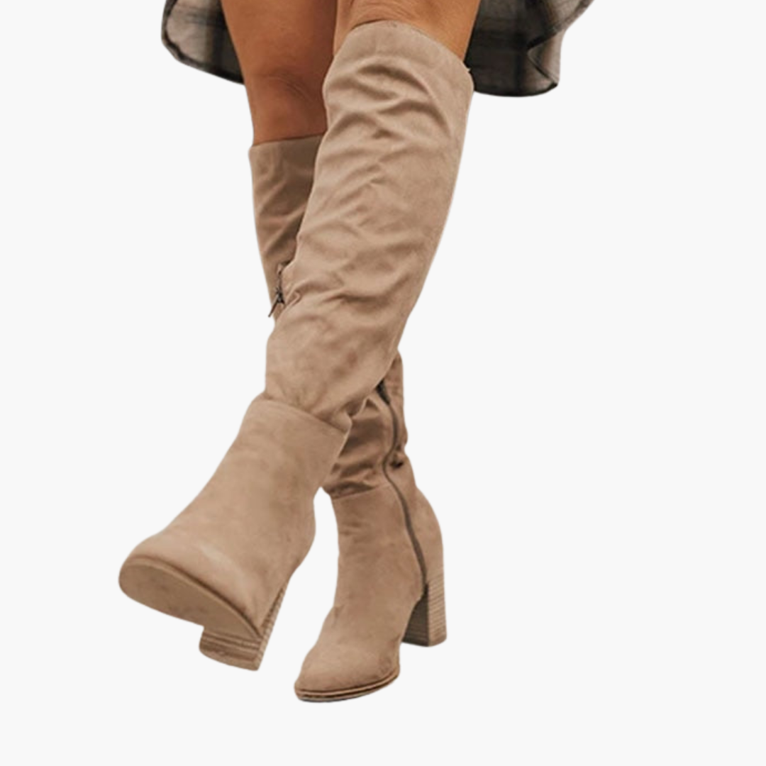 Women's black slouch knee-high boots with structured block heel and relaxed pull-on shaft