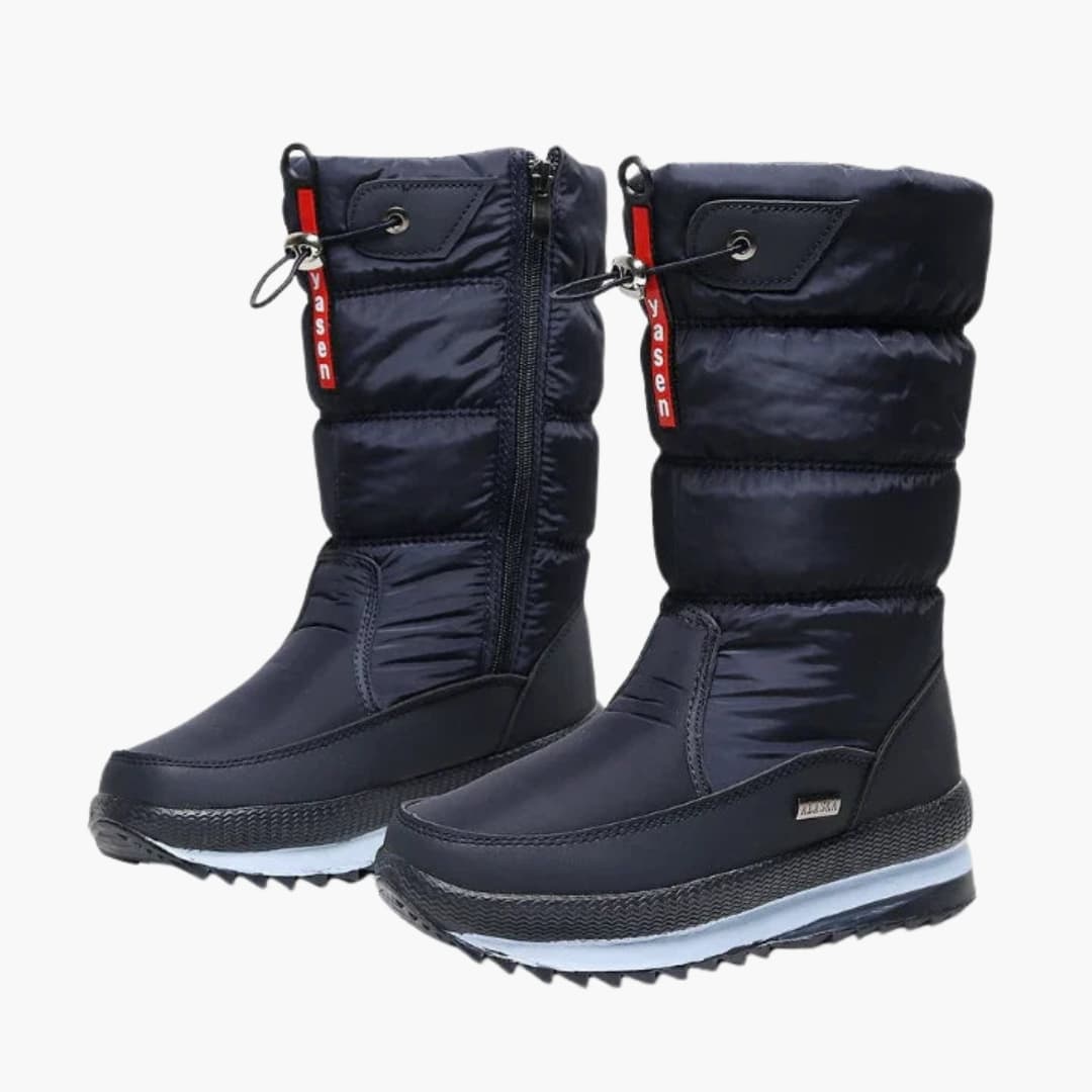 Women's mid-calf snow boots with side zipper, adjustable cord shaft, and textured sole for winter