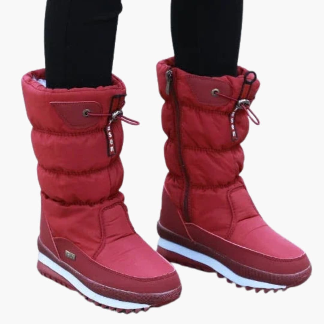 Women's mid-calf snow boots with side zipper, adjustable cord shaft, and textured sole for winter
