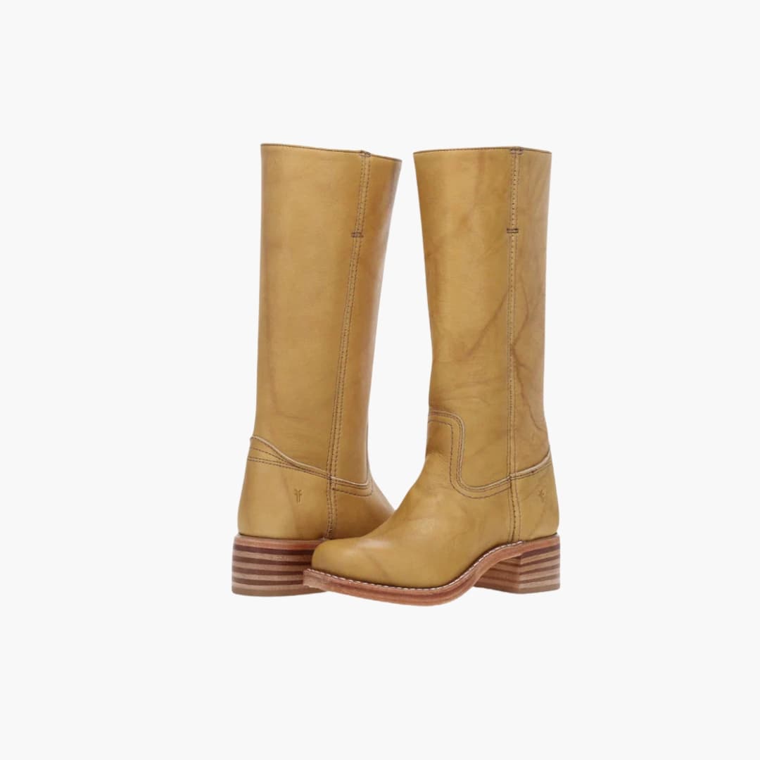 Women's black knee-high boots with stacked heel, round toe, side zip, and mid-calf shaft