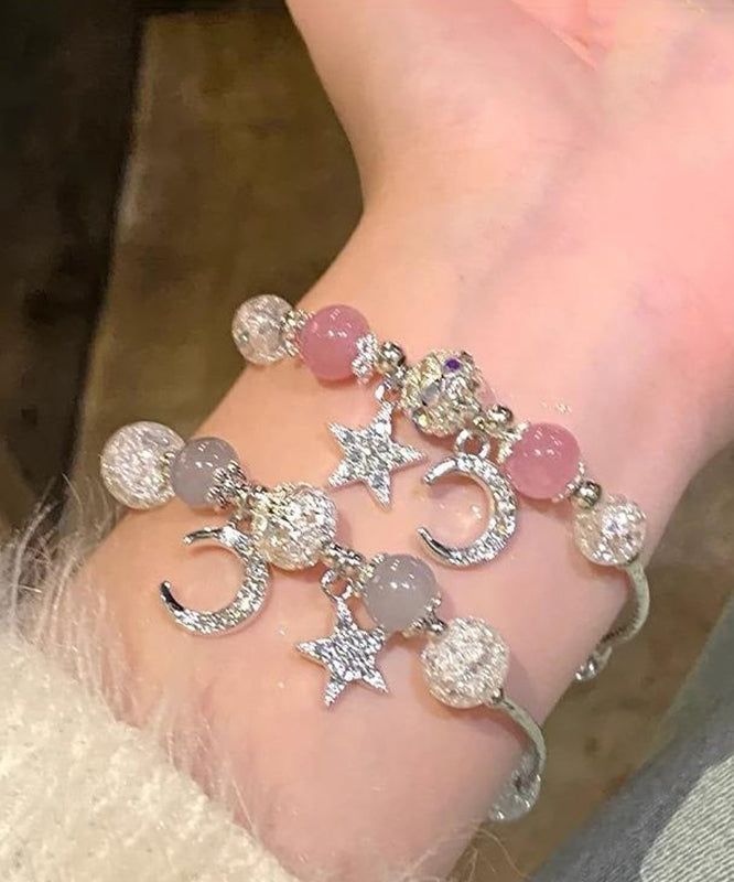 Ensemble de deux bracelets à breloques en alliage avec perles, lune, étoiles et pompons - Urbann-Vibe