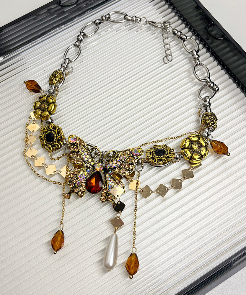 Collier avec pendentif papillon et pompon en alliage d'or et zircons - Urbann-Vibe