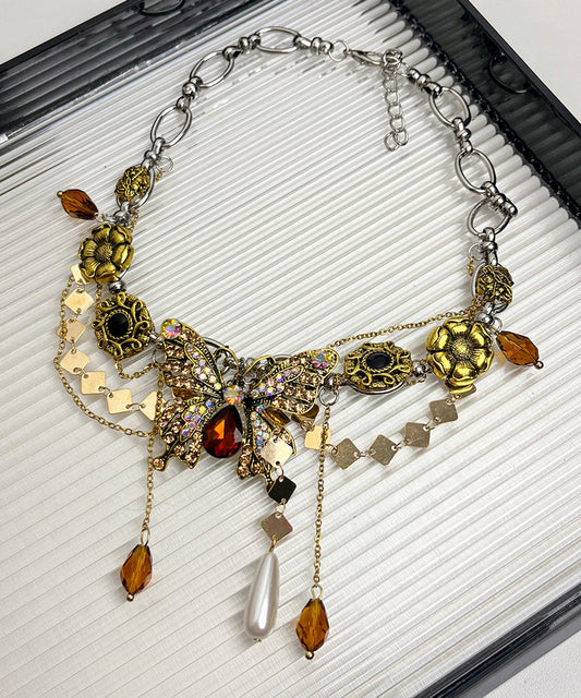 Collier avec pendentif papillon et pompon en alliage d'or et zircons - Urbann-Vibe