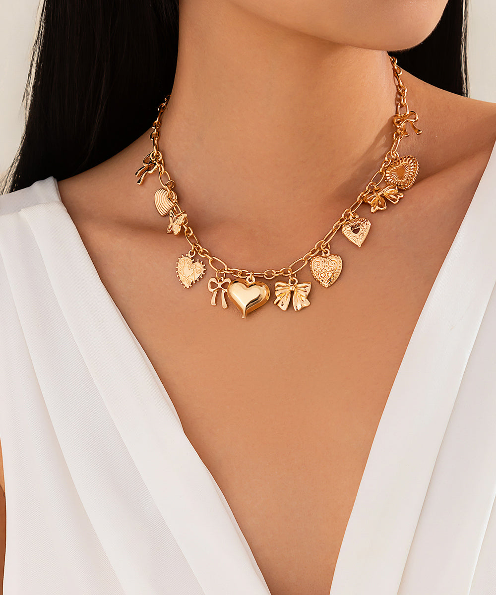Collier avec pendentif en forme de nœud d'amour en alliage de cuivre doré - Urbann-Vibe