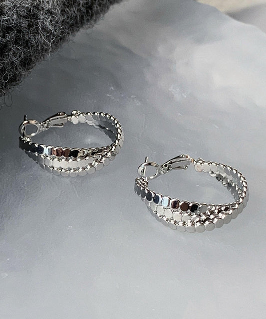 Boucles d'oreilles créoles torsadées en soie et argent sterling, style boutique. - Urbann-Vibe