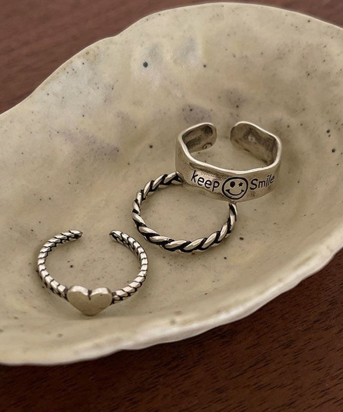 Ensemble de trois bagues en argent sterling Boutique Silk avec motif « Amour, visage souriant et torsades de pâte frite » - Urbann-Vibe