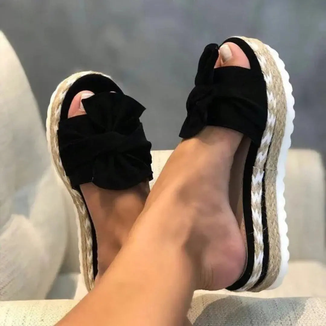 Women's braided bowknot wedge sandals with peep toe, espadrille wrap, and oversized bow detail