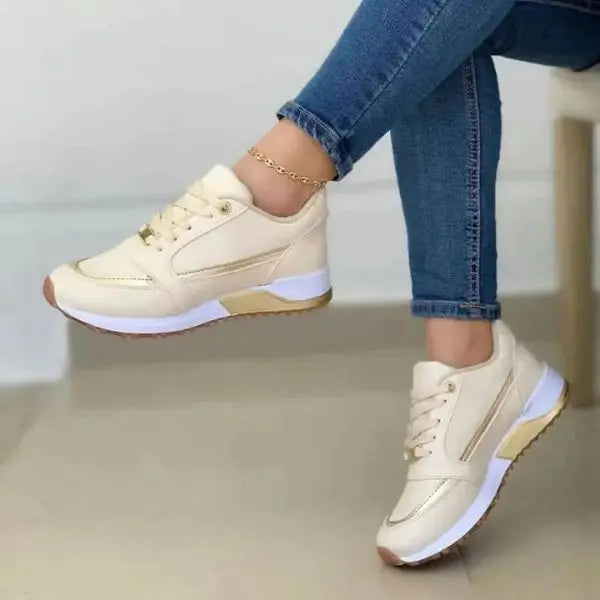 Women's white breathable lace-up sneakers with cushioned sole for all-day comfort and casual style