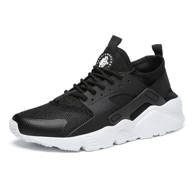 Women's white breathable cushioned sneakers with Huarache-inspired design for lightweight summer comfort