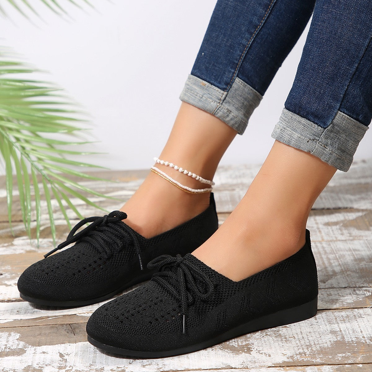Women's white lightweight knit lace-up sneakers with breathable upper for everyday casual wear
