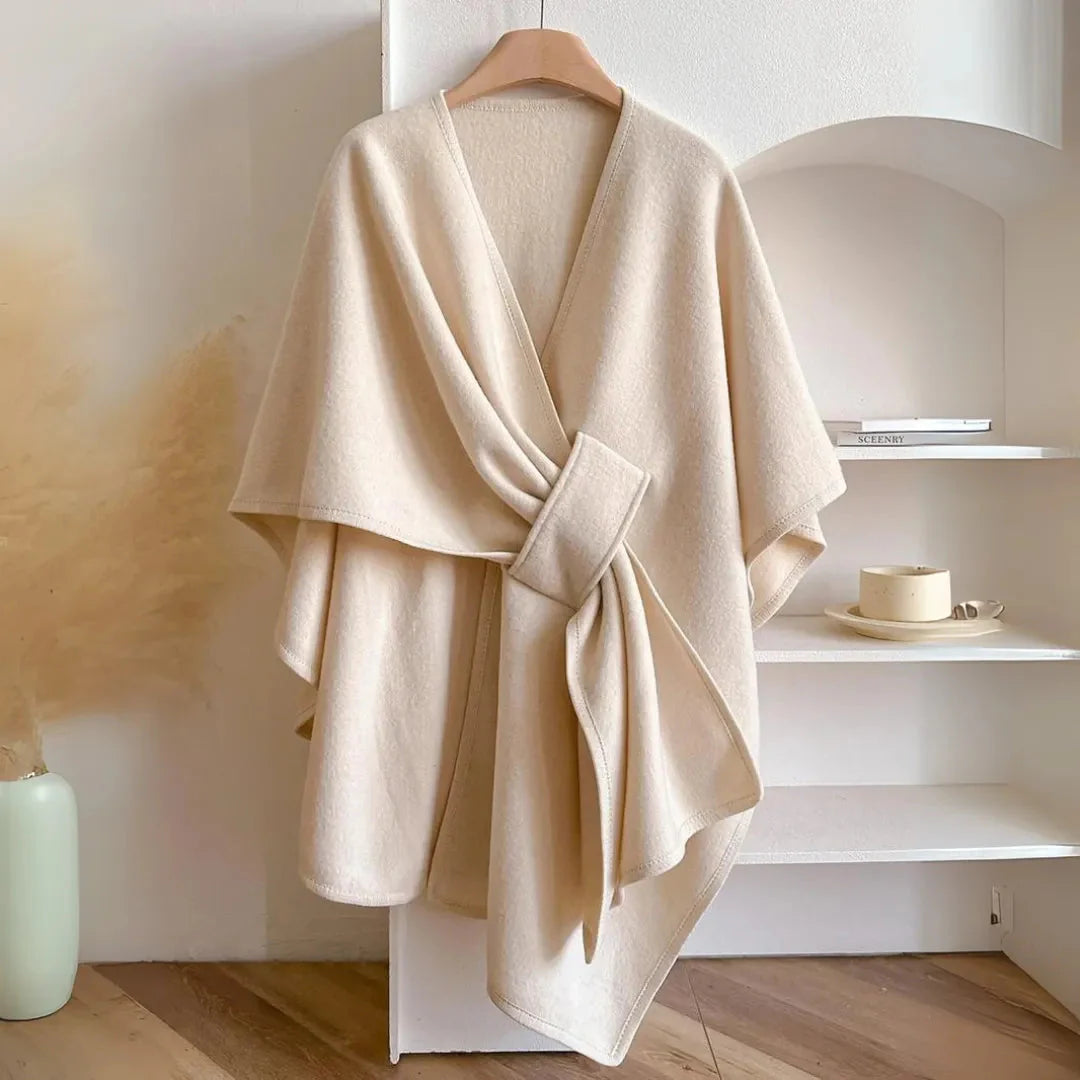 Women's gray fleece knit cape with belted waist, relaxed drape, and side pockets