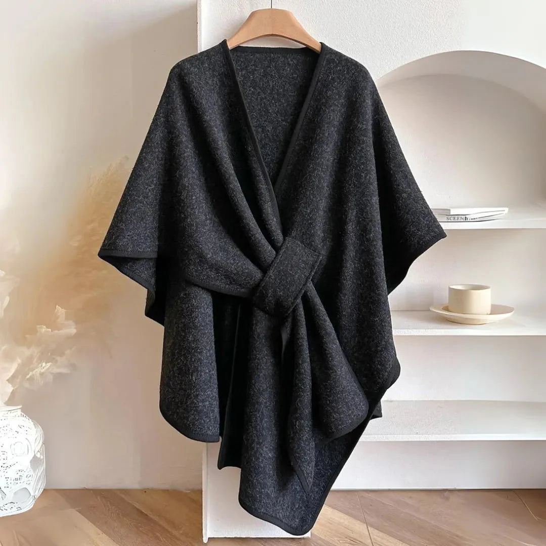 Women's gray fleece knit cape with belted waist, relaxed drape, and side pockets