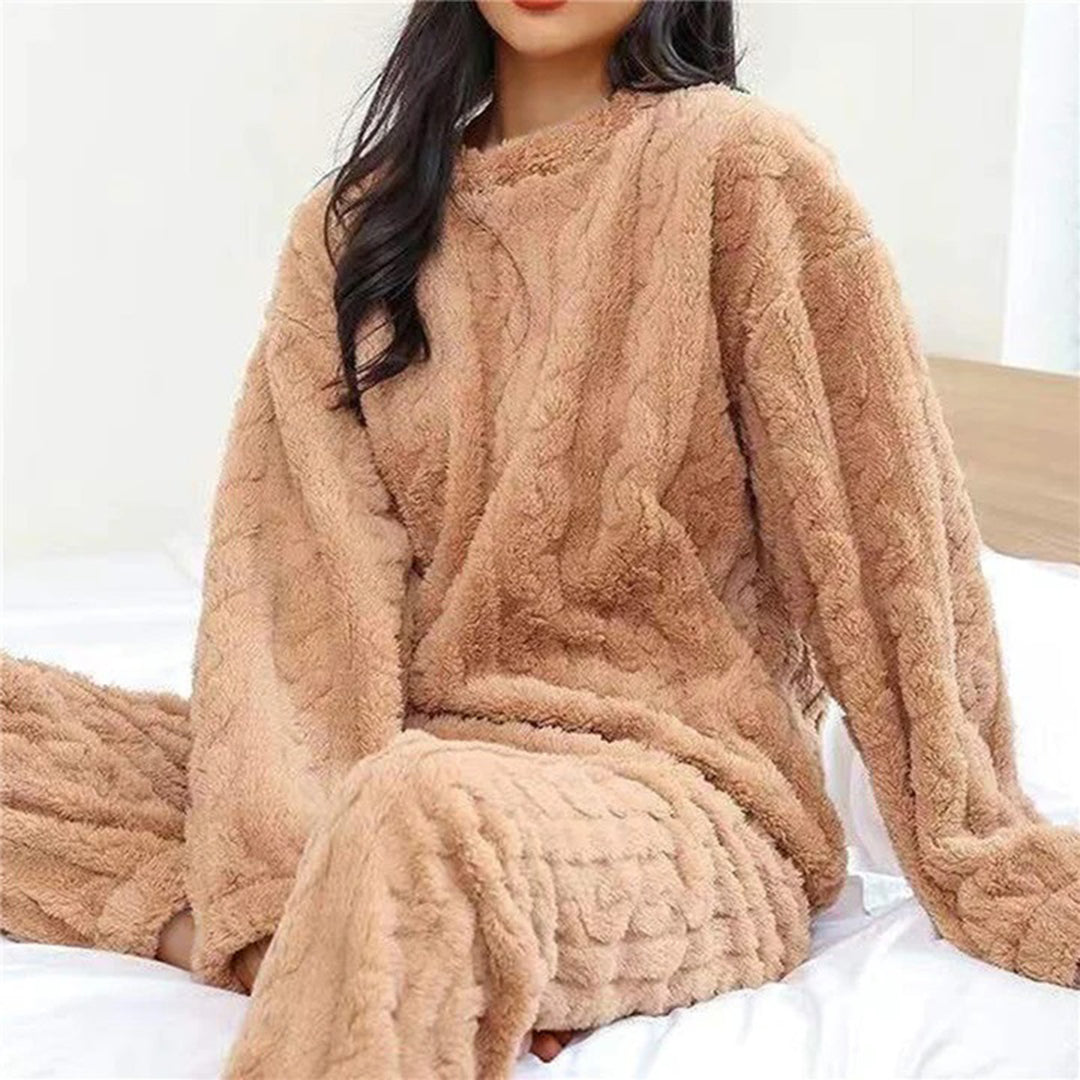 Women's luxurious pink pajama set, ultra-soft sustainable fabric, relaxed lounge fit with refined design