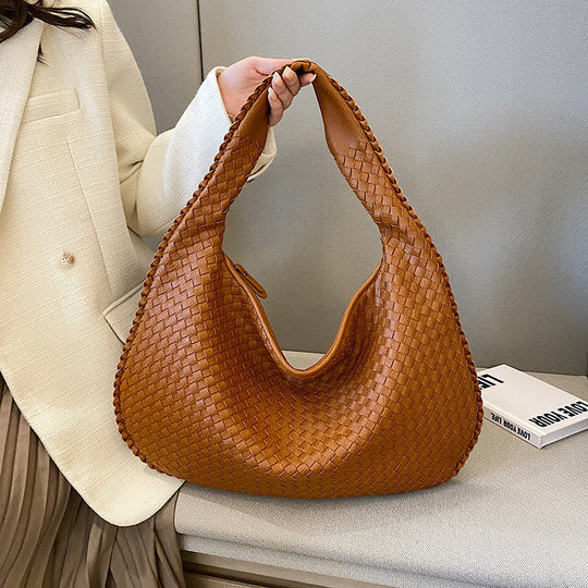 Braided eco-leather Mary shoulder bag for women with textured woven detailing and sustainable finish