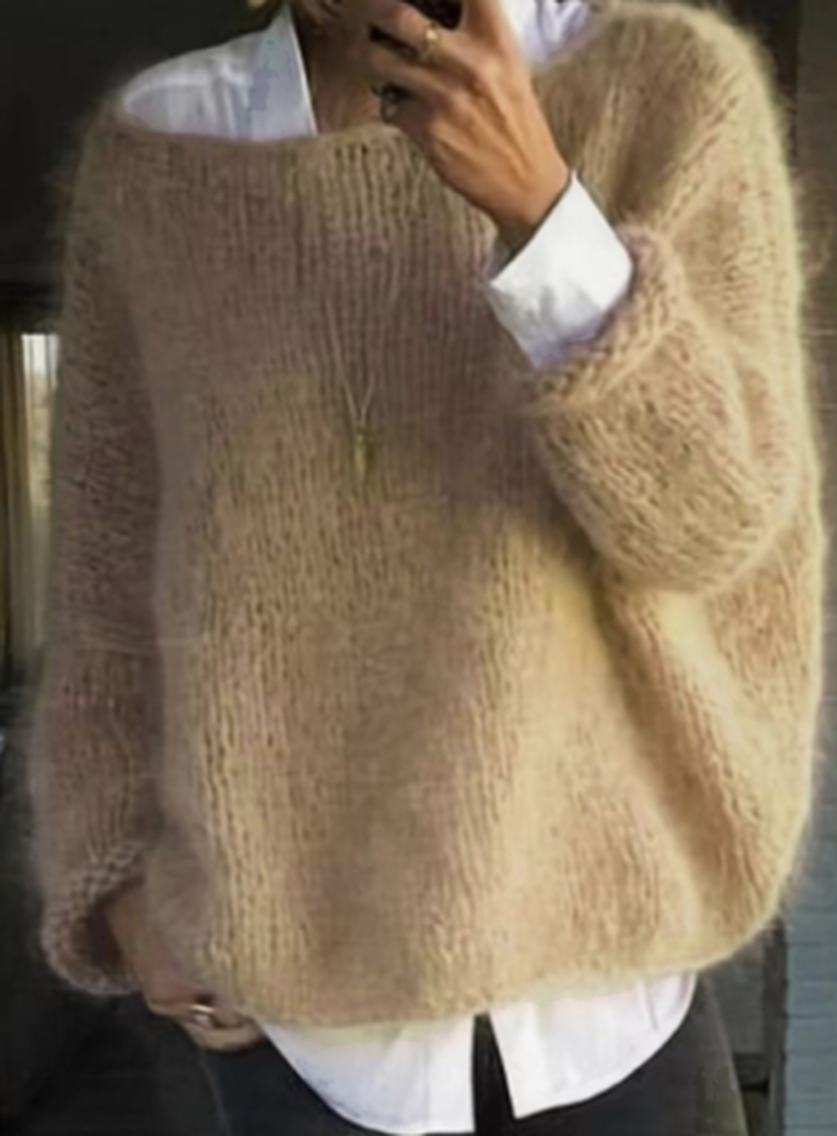 Women's relaxed fit cozy fuzzy knit sweater in soft neutral tones for effortless winter layering