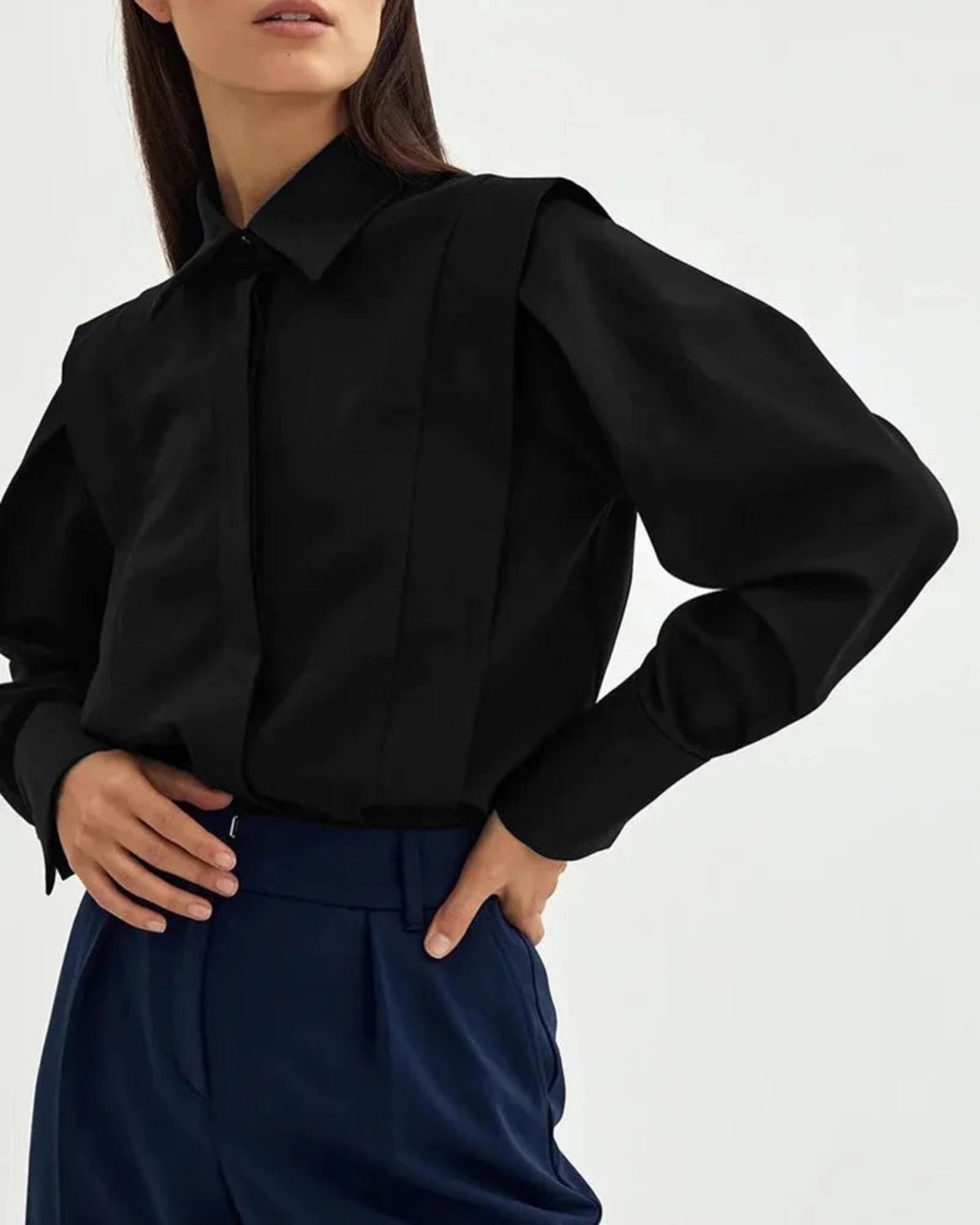White cotton button-down shirt structured square silhouette wide cuffs tailored professional style