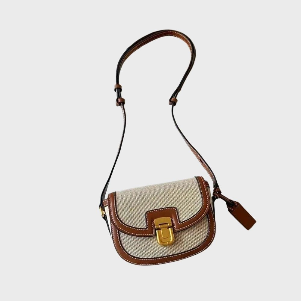 Women's black faux leather flap shoulder crossbody bag with zipper closure, elegant everyday style