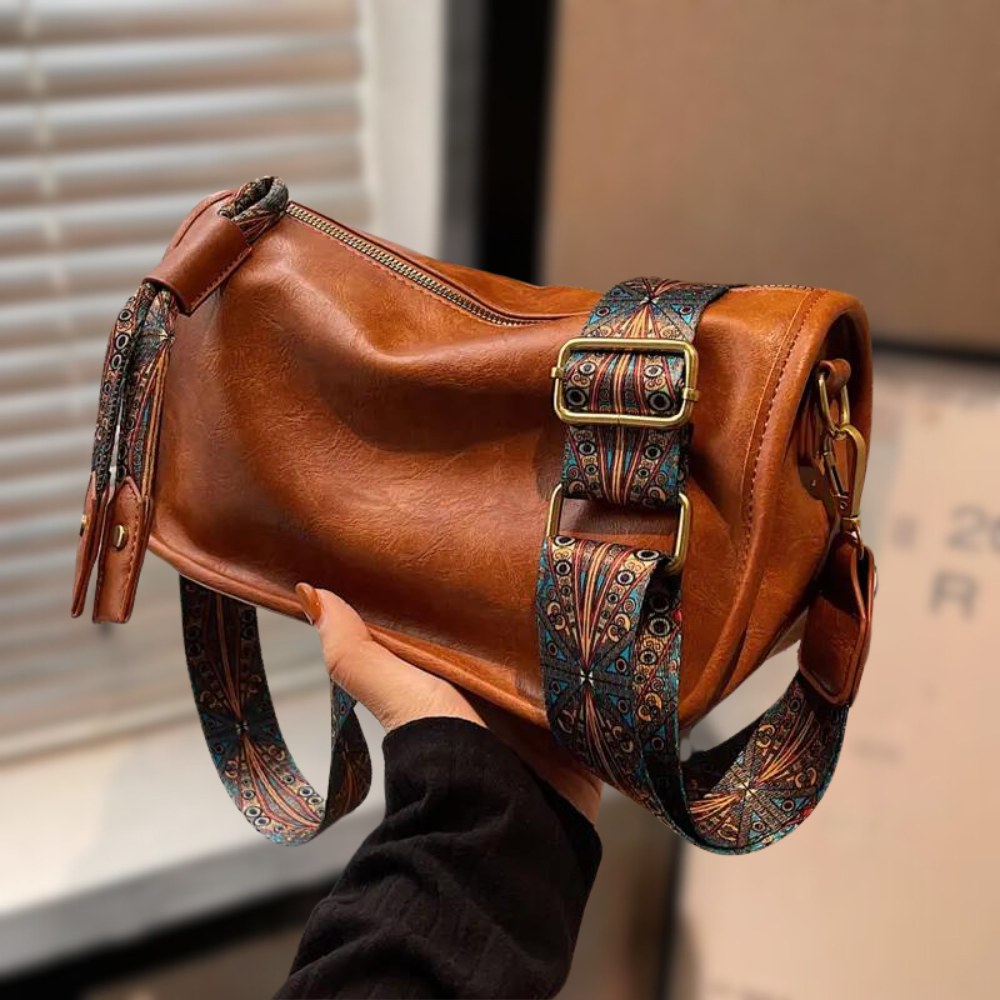 Black leather crossbody bag women elegant sleek design durable zipper cowhide lining everyday handbag