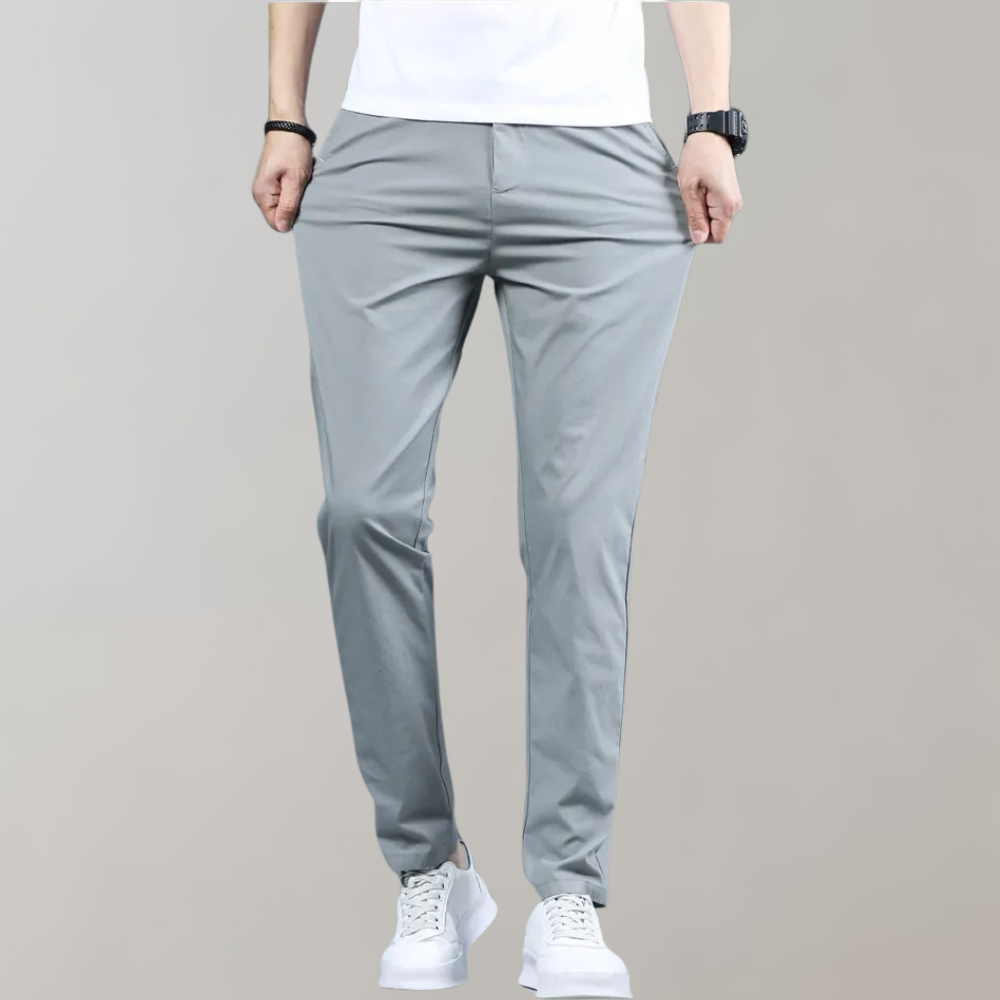 Men's slim-fit casual pants in neutral tone, tailored cut with breathable fabric for office wear