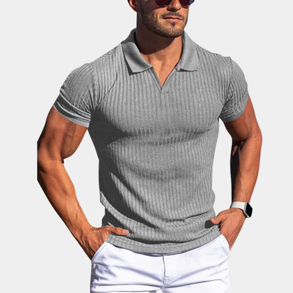 Men's slim fit cotton polo shirt with ribbed collar and smart tailored silhouette for casual wear