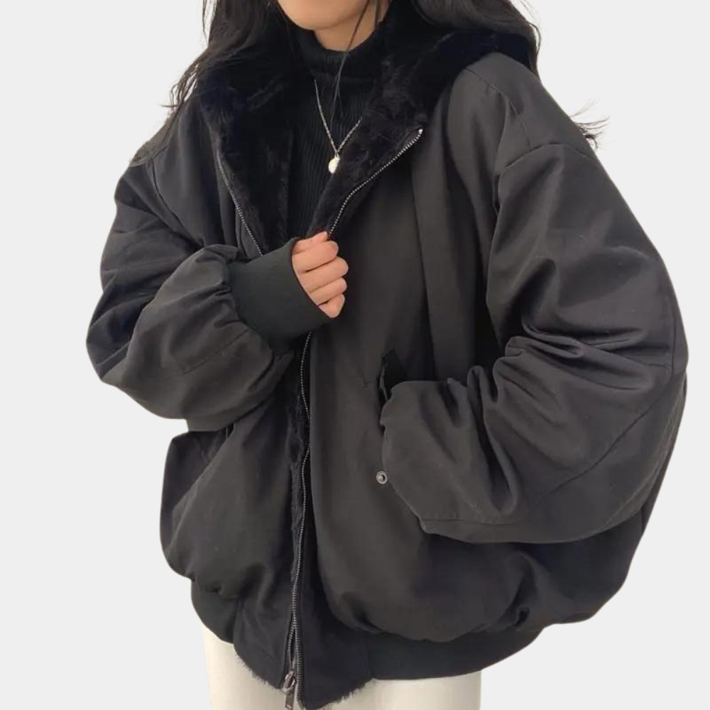 Women's grey oversized winter jacket with plush warmth, relaxed silhouette, and flattering everyday fit