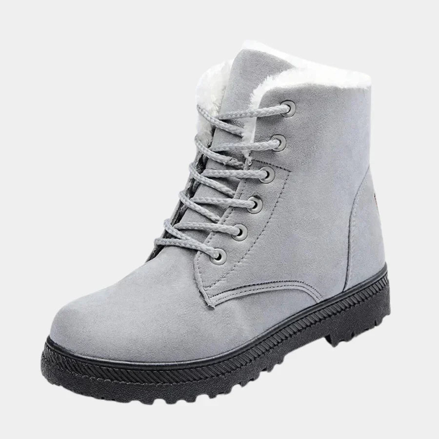 Women's slip-on boots neutral tone easy wear design no laces sustainable everyday versatile style