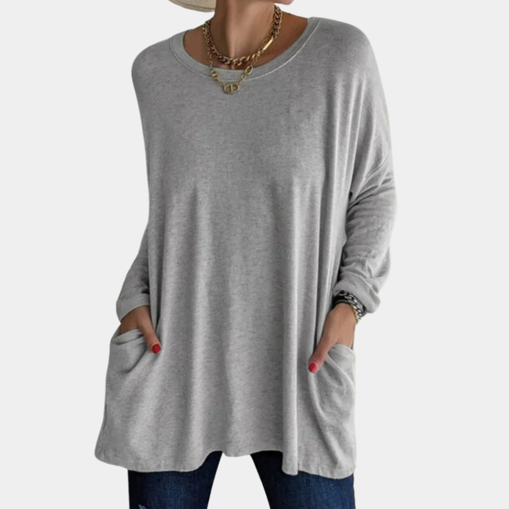 Women's oversized knit tunic sweater in cozy soft fabric with round neck and side pockets lounge top