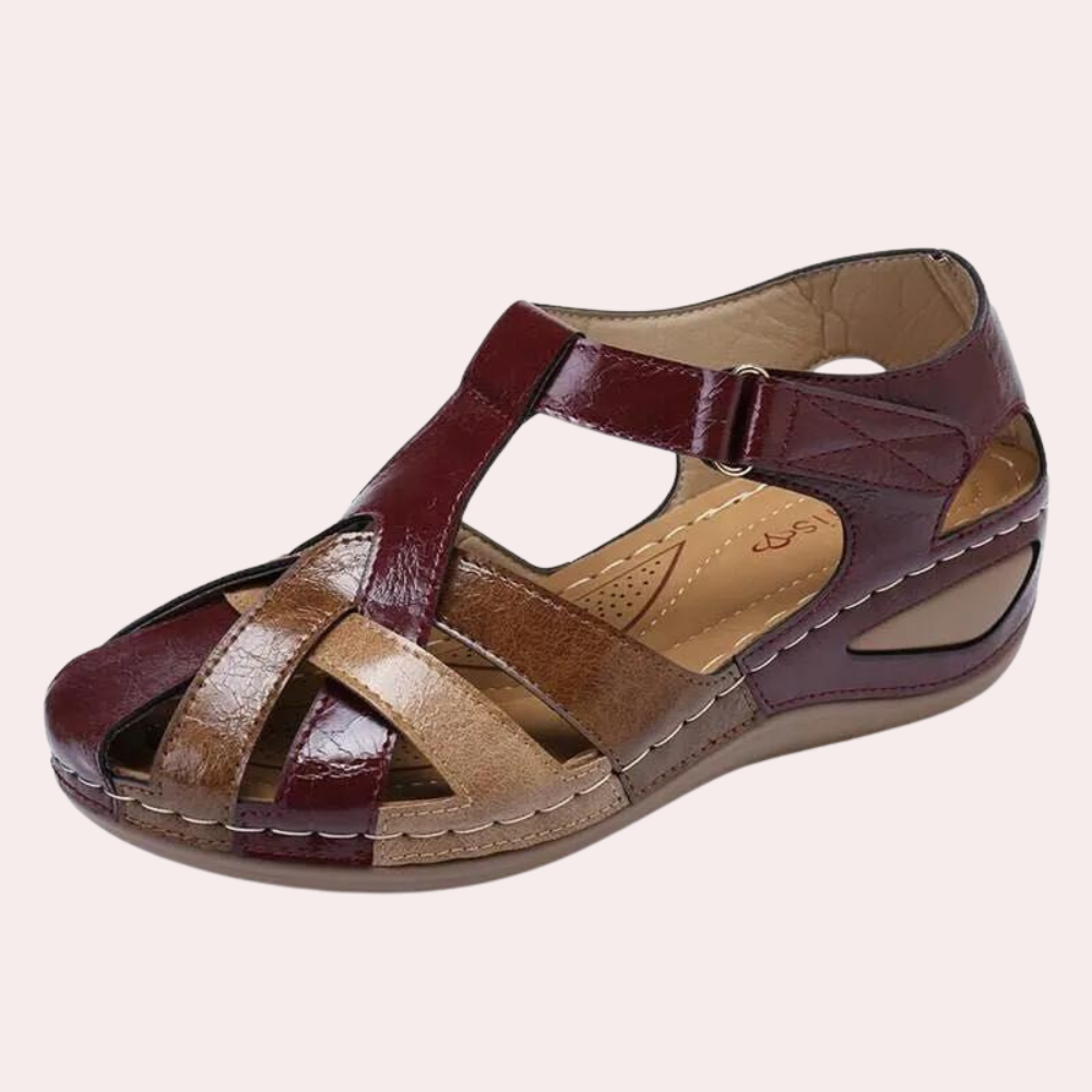 Women's leather-look sandals with adjustable strap and cushioned shock-absorbing sole for all-day comfort