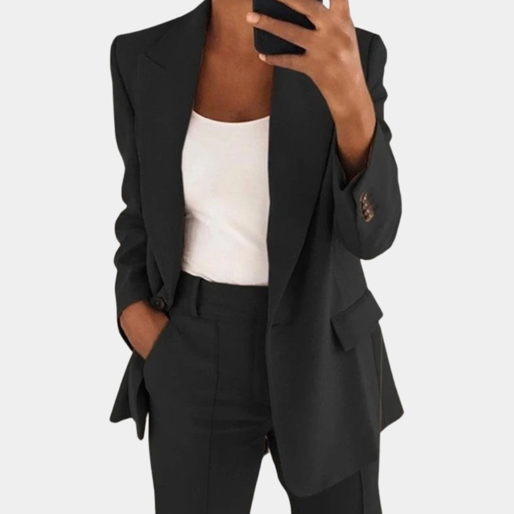 Women's black tailored 2-piece blazer and pants set with polished coordinating design for office wear