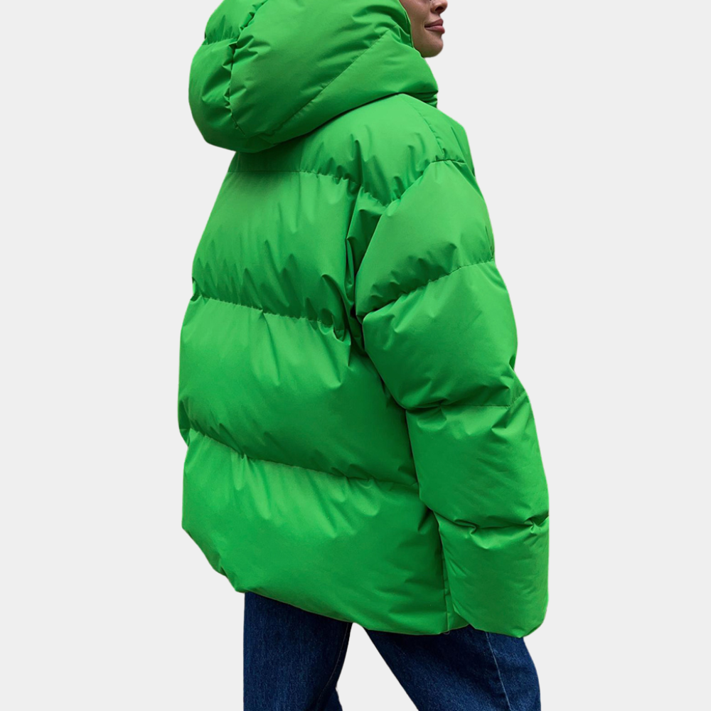 Women's oversized quilted puffer jacket in neutral tone with cozy hood, water-repellent winter coat