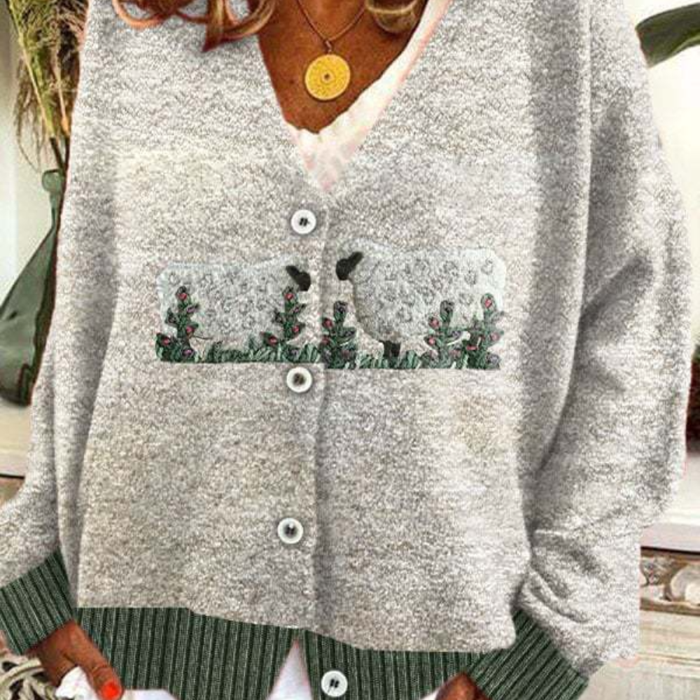 Women's relaxed fit V-neck knit cardigan with button closure and playful sheep motif