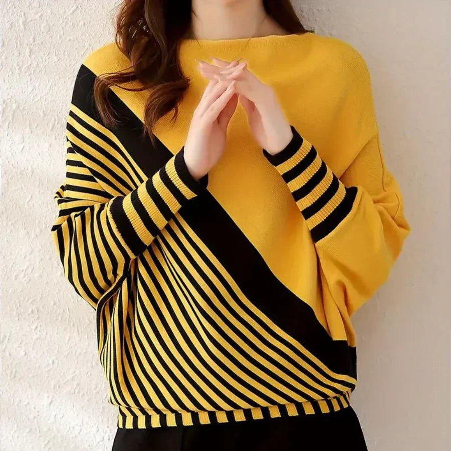 Women's cozy striped batwing jumper with relaxed fit and sustainable everyday comfort style