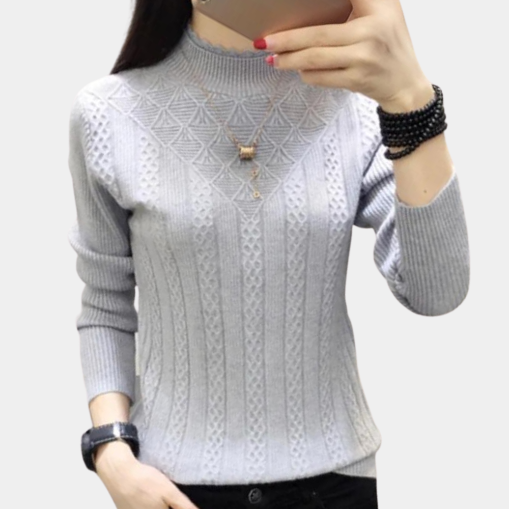 Women's soft knit turtleneck sweater in cozy winter style with elegant drape and sustainable easy care