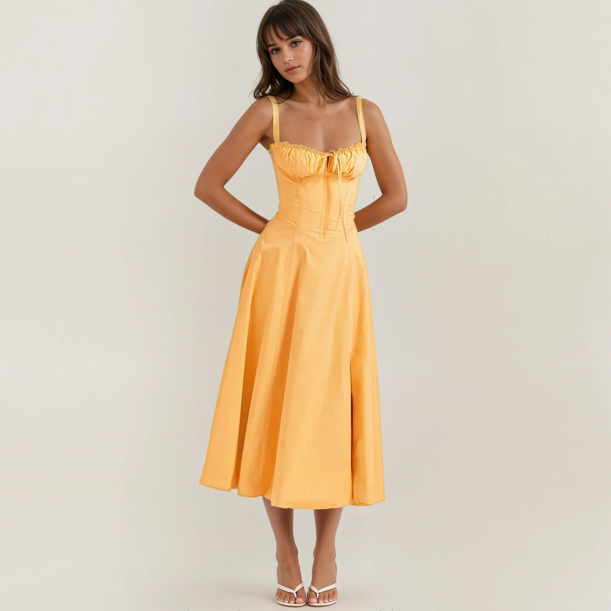 Black corset midi dress with structured bodice, flared skirt, and romantic party-ready silhouette