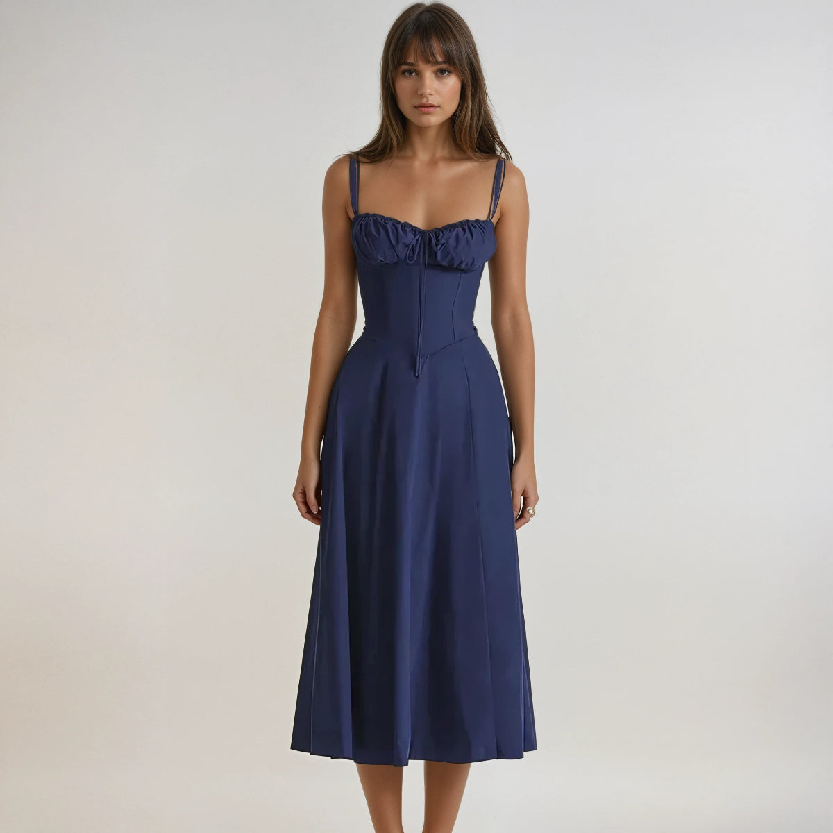 Black corset midi dress with structured bodice, flared skirt, and romantic party-ready silhouette