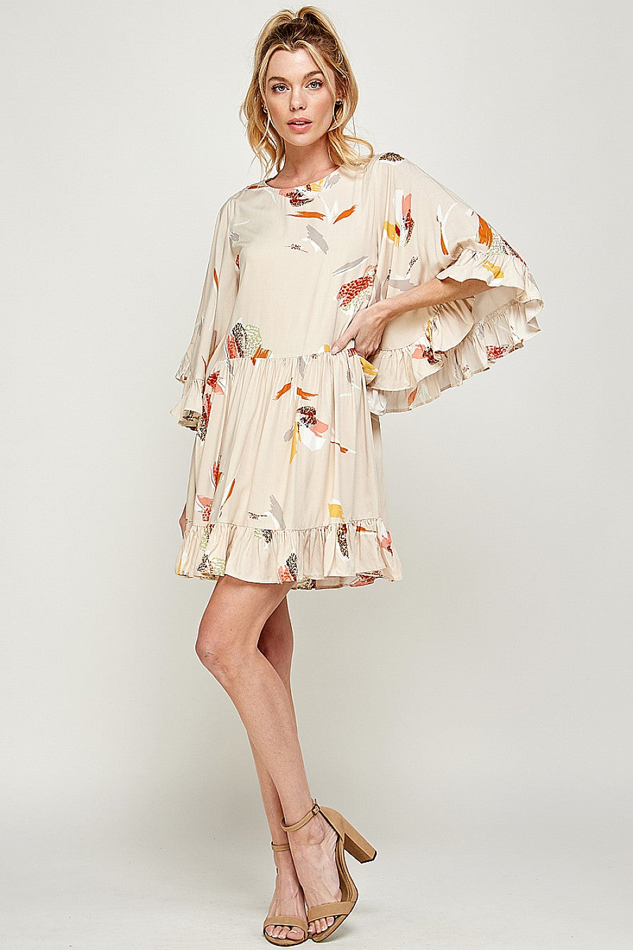 Cognac taupe mini ruffle dress with wacky bold print, 3/4 sleeves, above-knee length night out