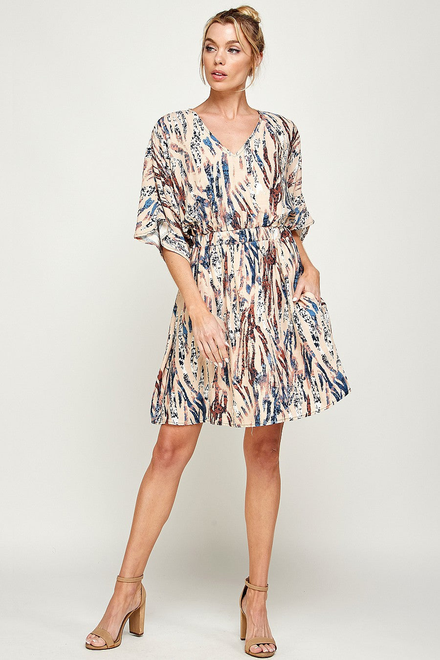 Black taupe zebra print V-neck mini dress with pockets, bold modern style for women