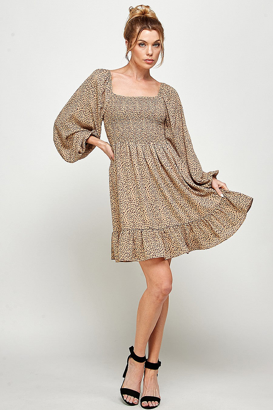 Beige camel cheetah print smocked mini dress with long sleeves, bold animal print night out style