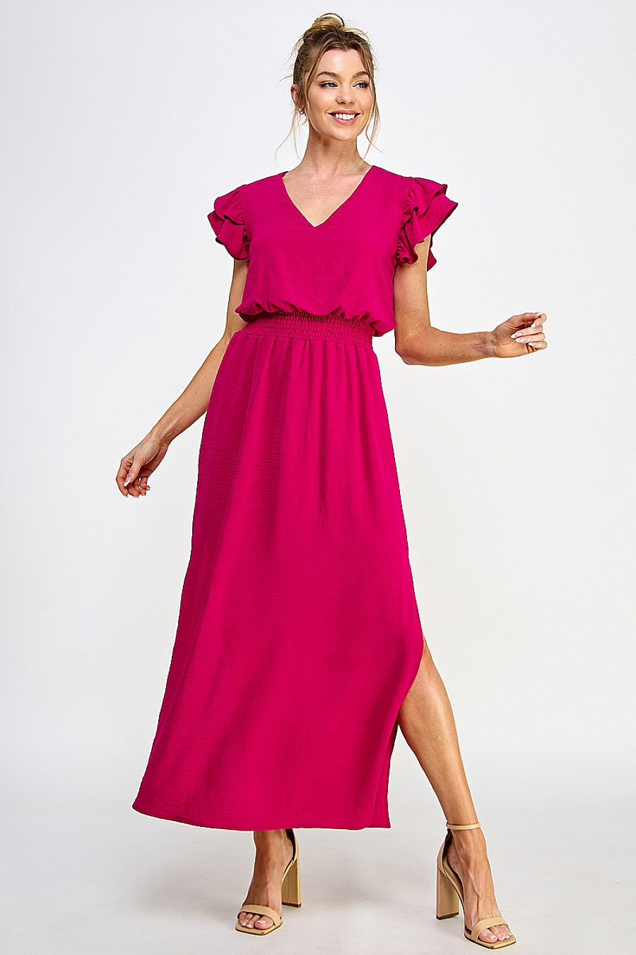 Elegant black maxi dress with deep V-neck, cascading ruffles, and daring side slit for women