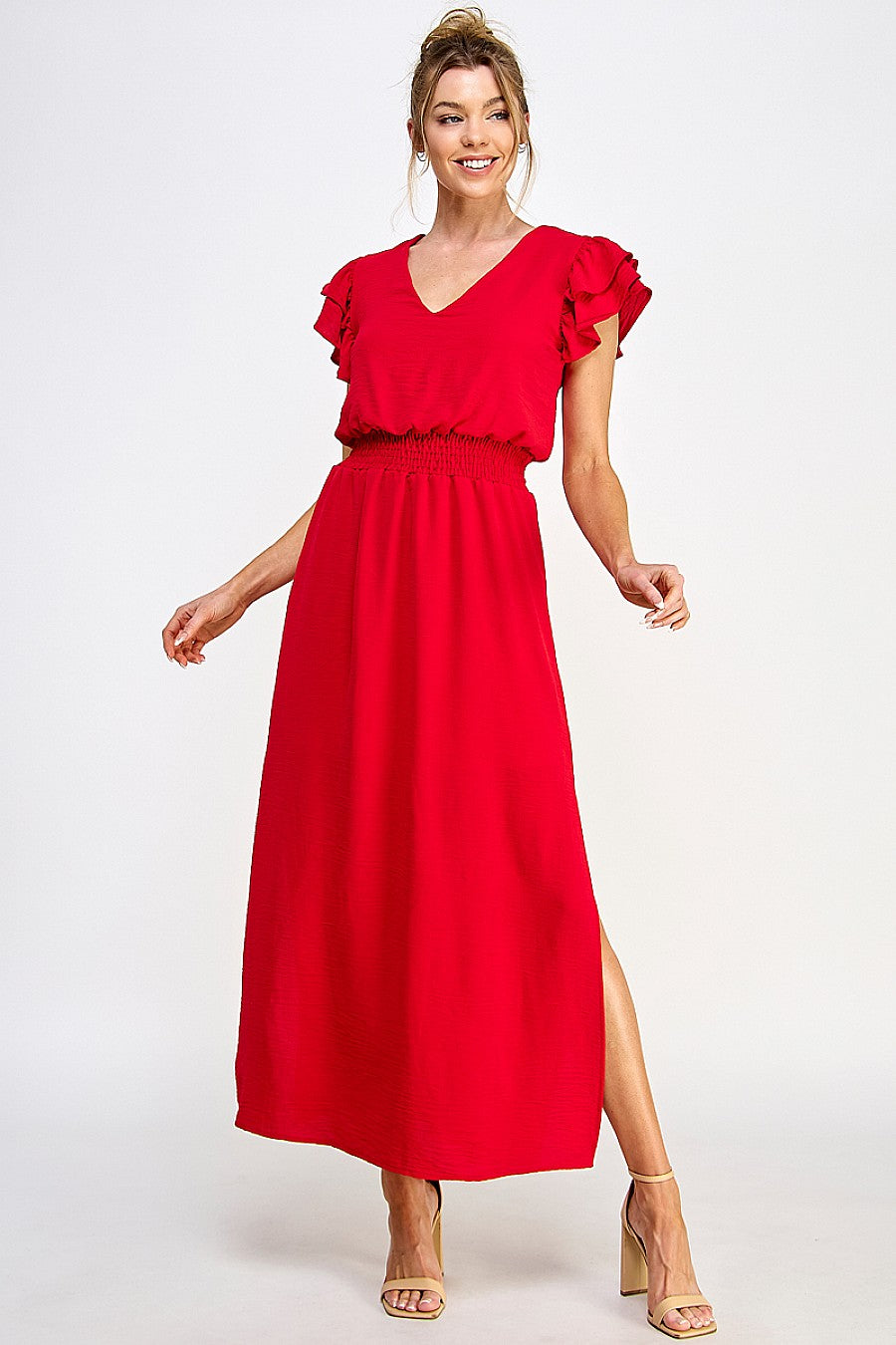 Elegant black maxi dress with deep V-neck, cascading ruffles, and daring side slit for women