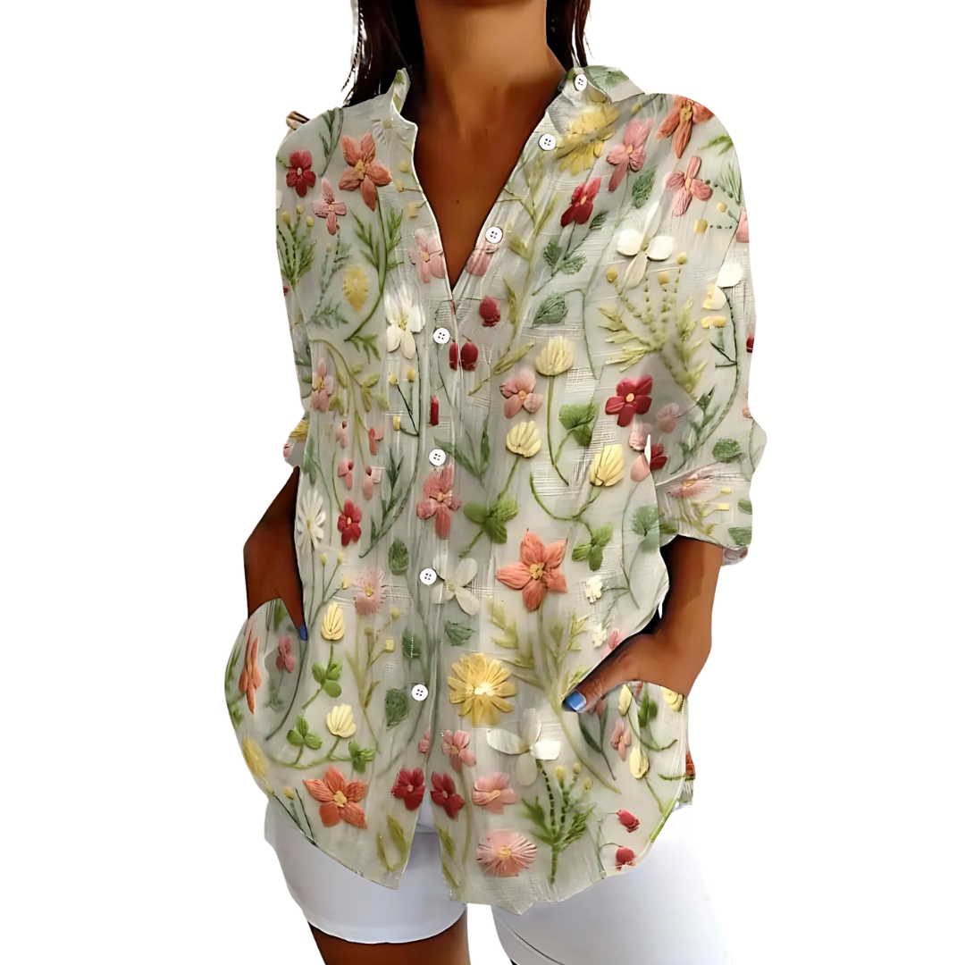 Women's white linen blouse with handcrafted embroidery, relaxed elegant cut for timeless artisanal style