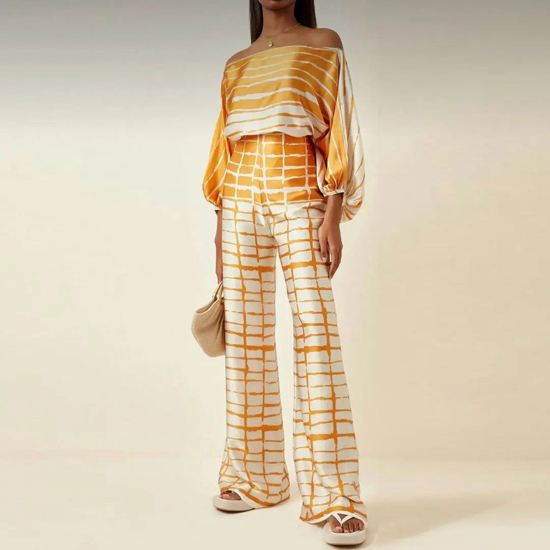 Women's satin two-piece set abstract print off-shoulder batwing top wide leg pants vacation outfit