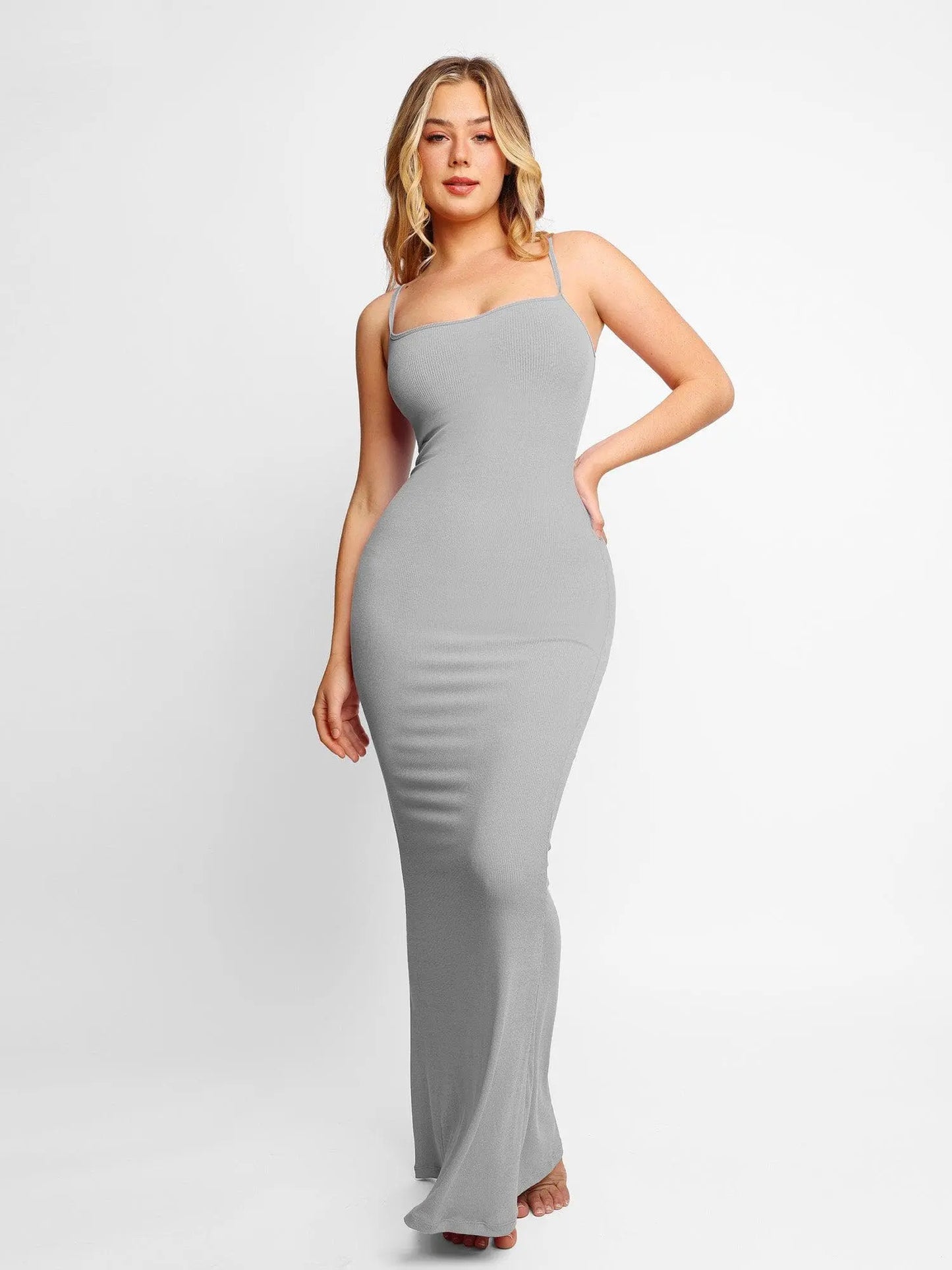 Black sculpted bodycon maxi gown sleek full-length silhouette curve-skimming fit day to evening