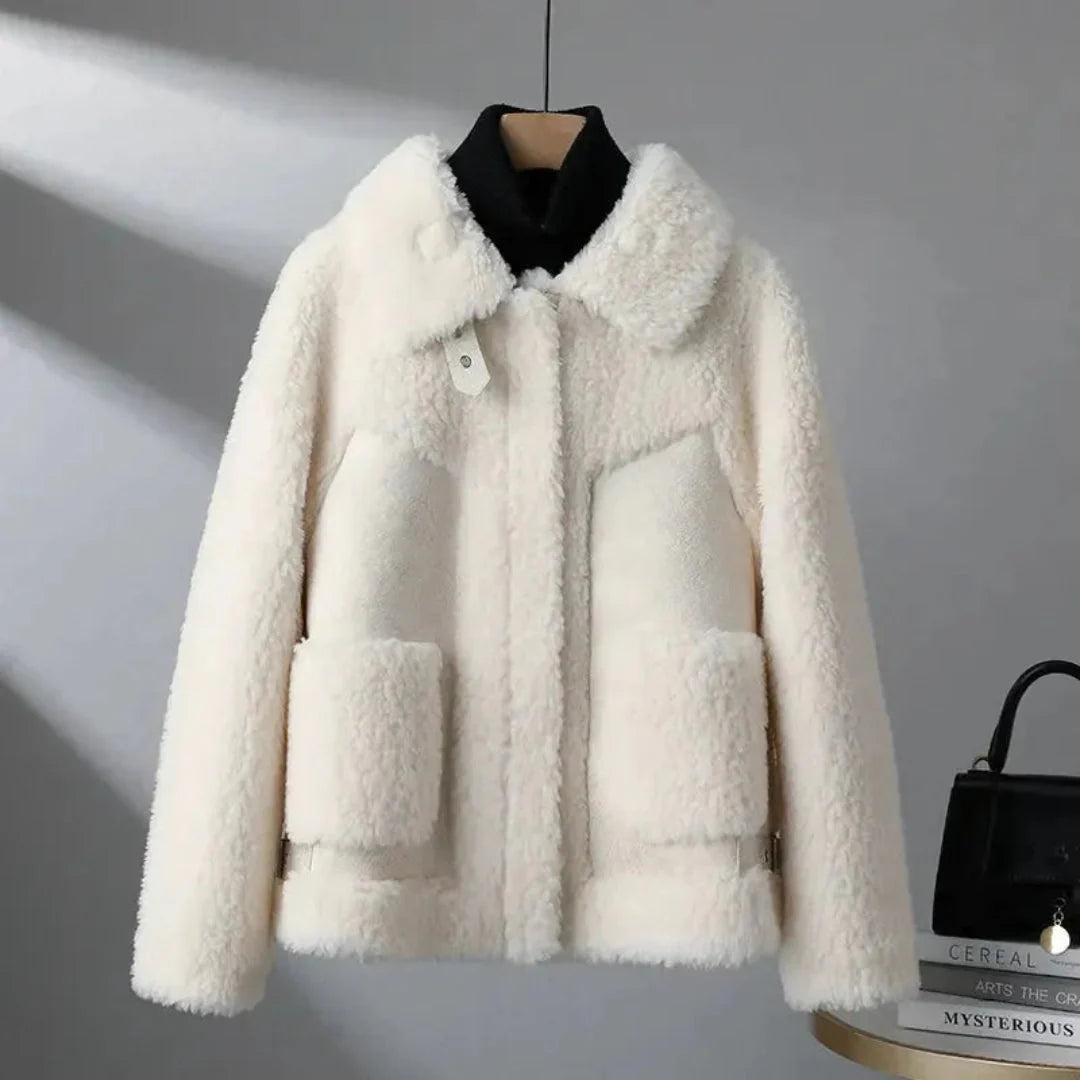 Camel lambswool overcoat with plush granular texture and tailored Italian-inspired collar silhouette