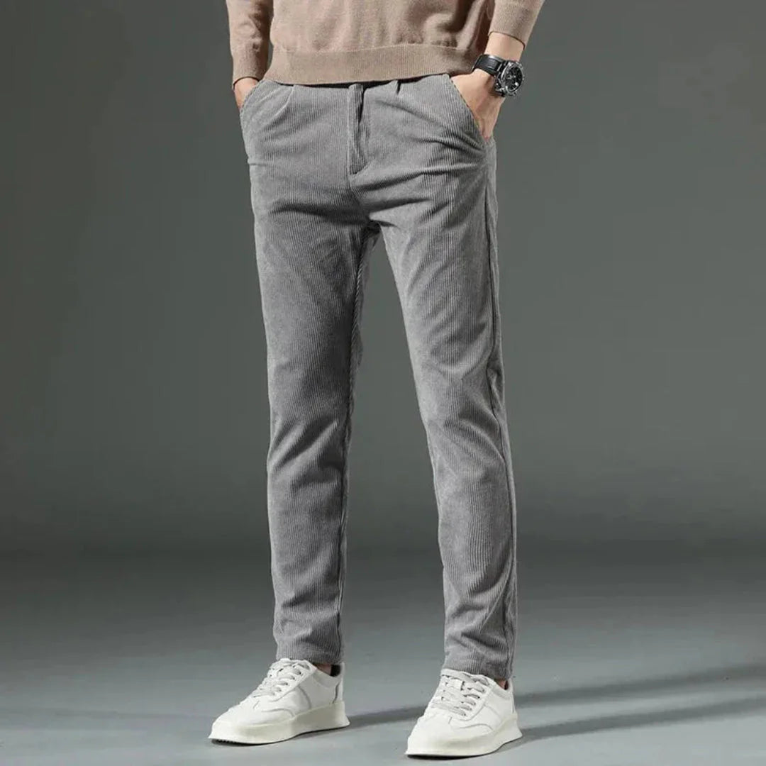 Men's slim fit corduroy pants in classic neutral tone with soft breathable fabric and tailored everyday style