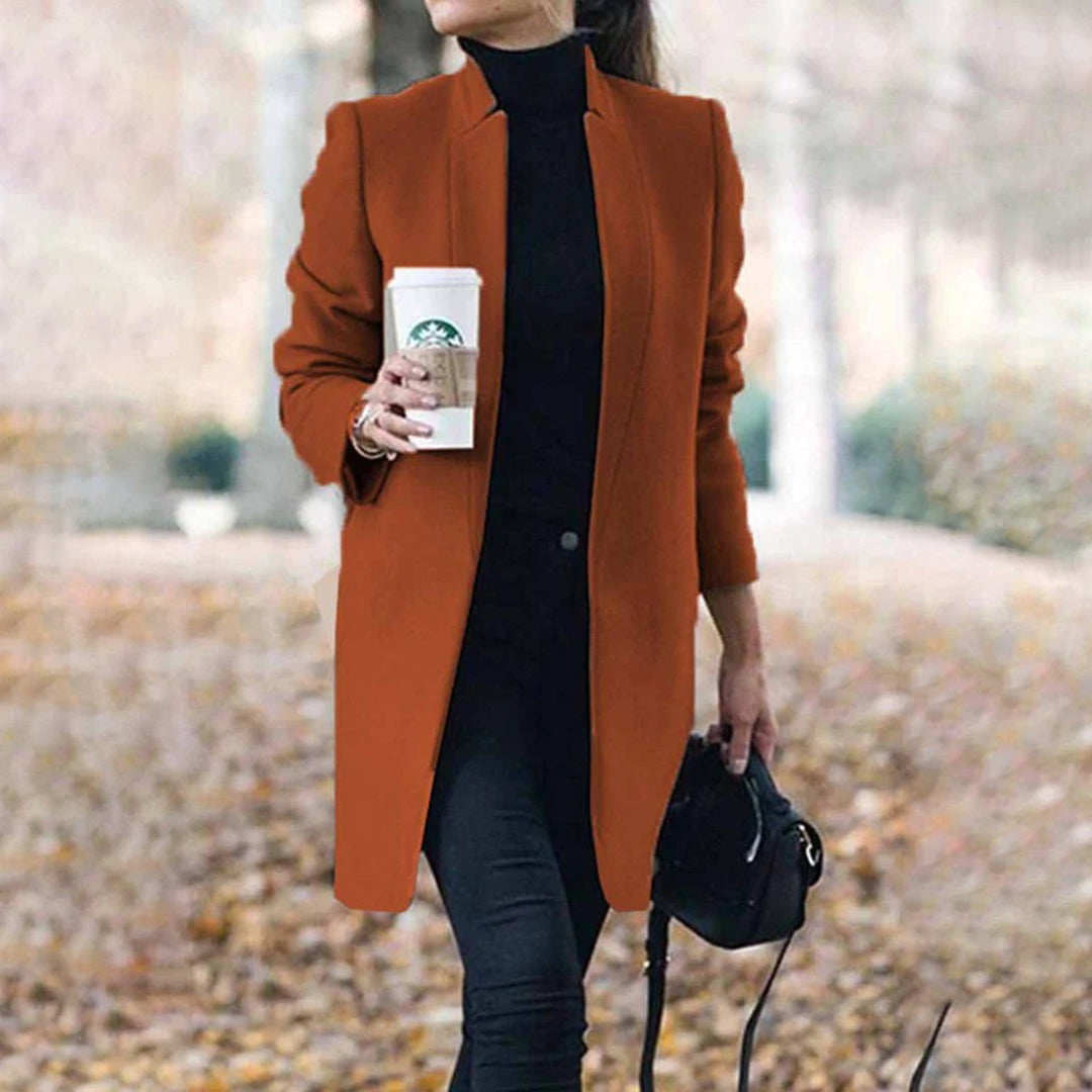 Women's tailored winter coat classic lapel structured fit professional elegant silhouette