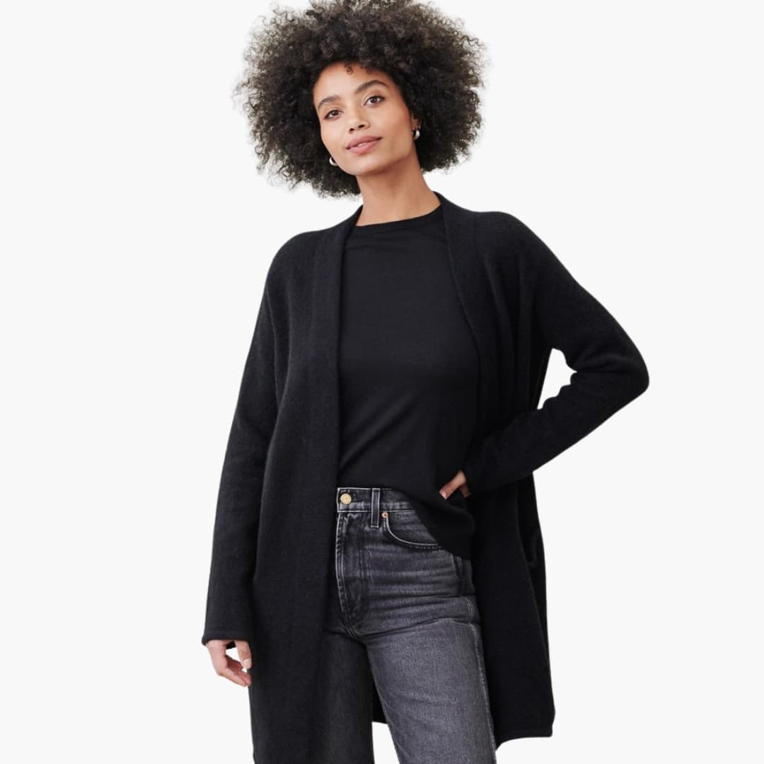 Women's longline open cardigan with side pockets, smooth fabric, sleek silhouette for work and everyday wear