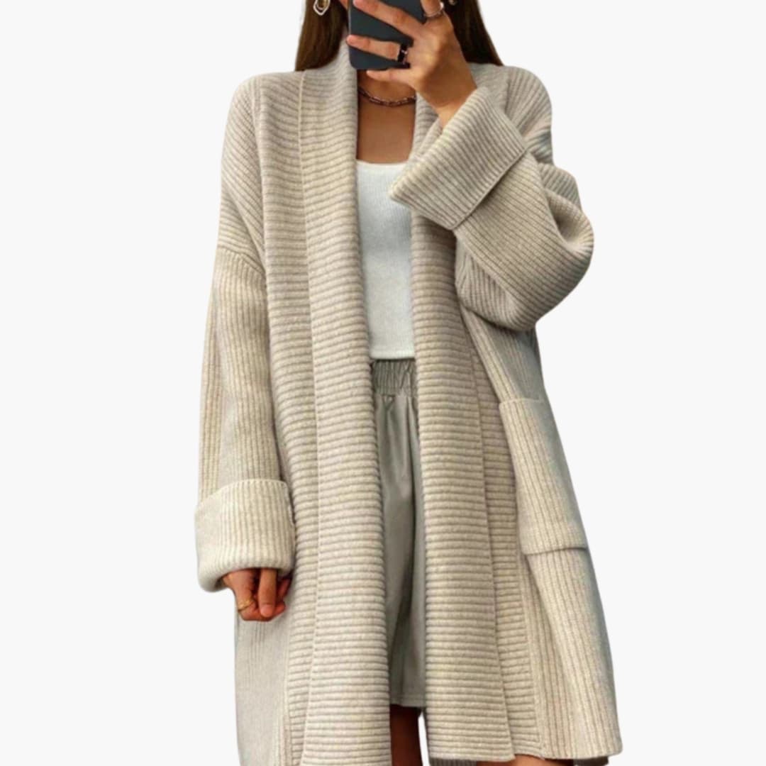 Women's long ribbed open-front cardigan with front pockets, cozy knit layering piece for everyday wear
